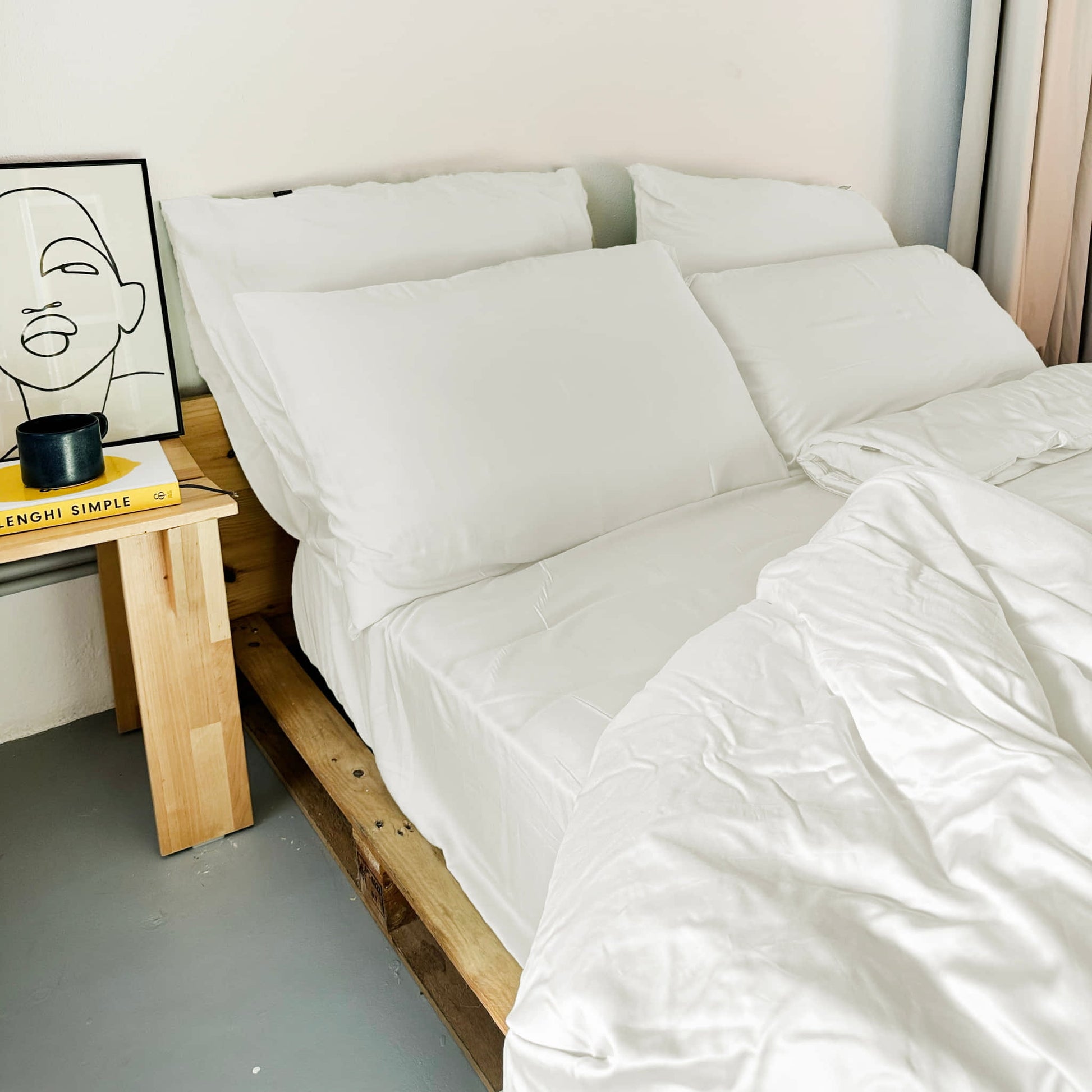 Double bed with white bamboo bedding set – sheets and pillows, soft, breathable and sustainable