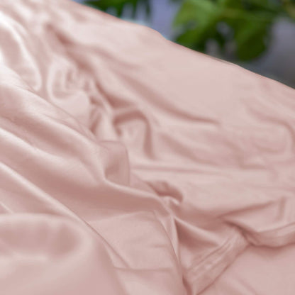 Close-up of pink bamboo fabric texture – soft, breathable and sustainable bedding material