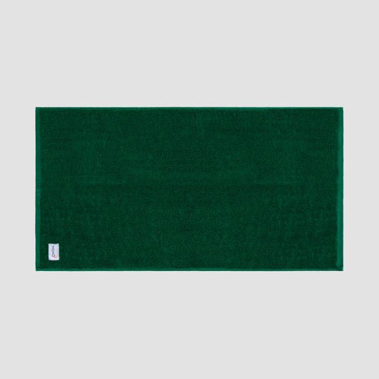 Tapete de banho verde em bambu da Momo Cotton – suave, absorvente, seca rapidamente e sustentável.